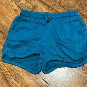 Play condition Tea Collection sz 6 green Pom Pom shorts